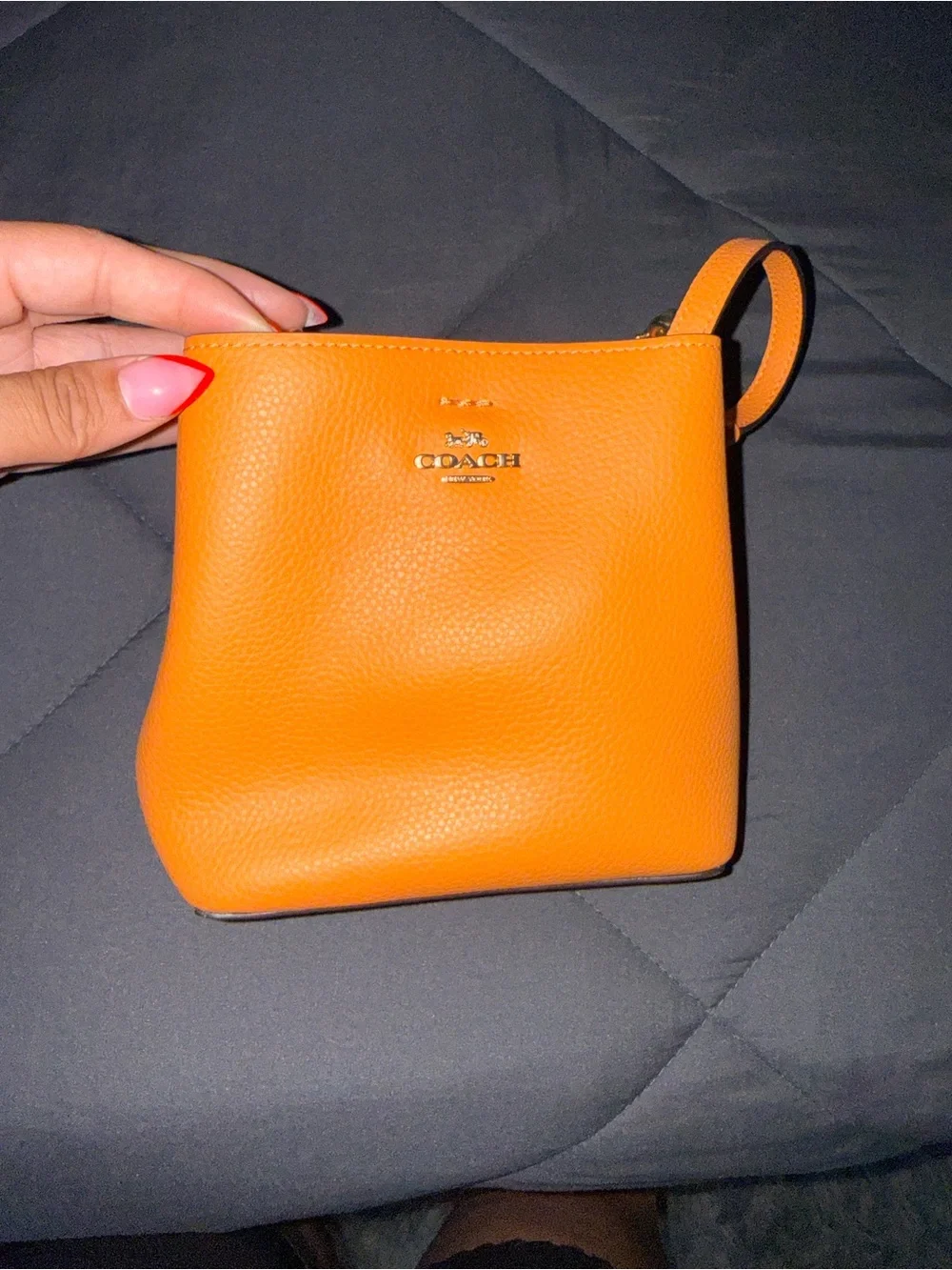 Coach Pebble Leather Wristlet in Bright Orange